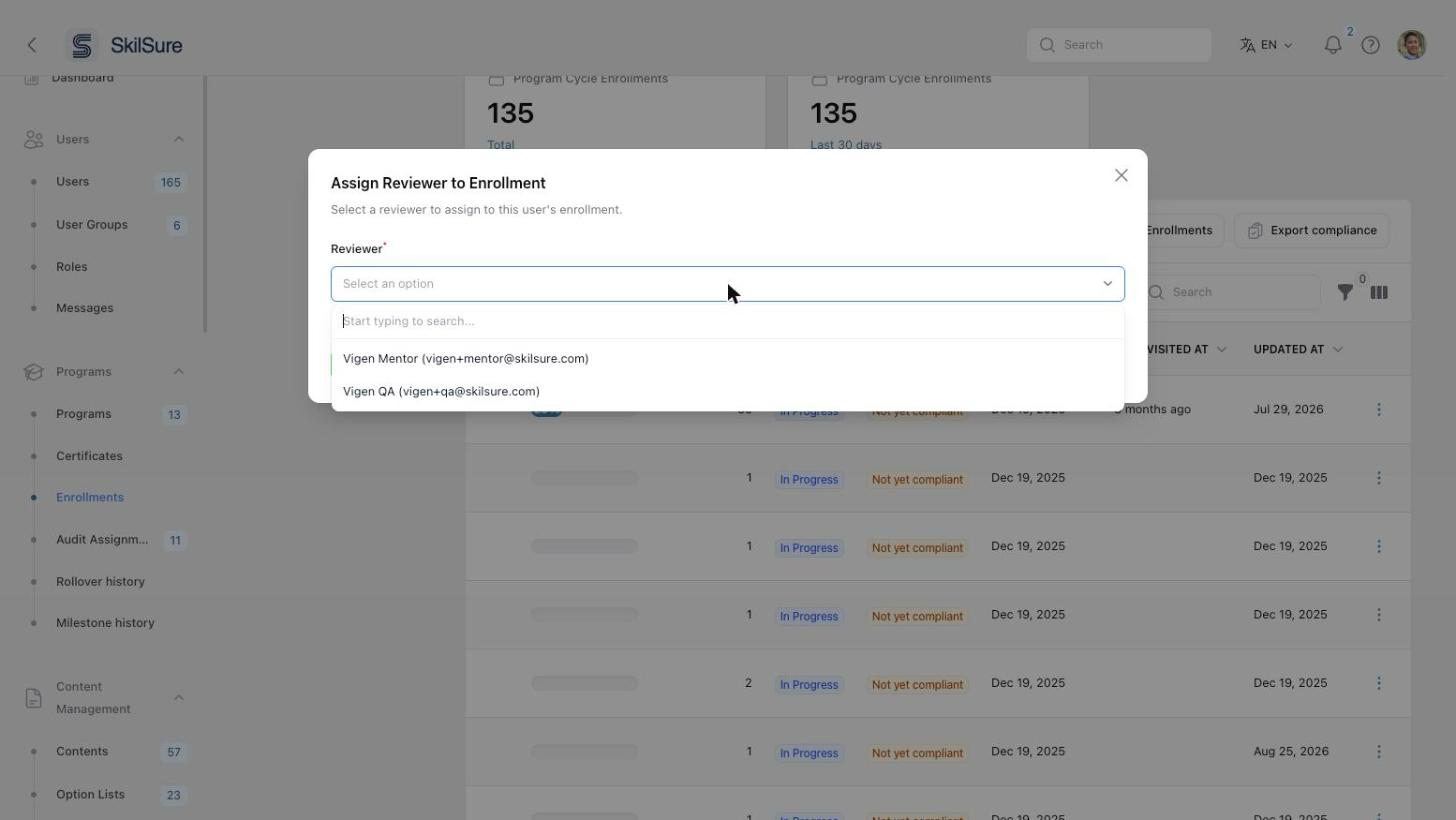 The Assign Reviewer to Enrollment dialog with the Reviewer list open, showing two reviewers by name and email.